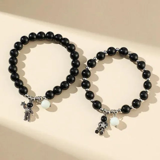 SET PULSERAS PAREJA LUMINOSA SAN VALENTÍN ASTRONAUTA NEGRO
