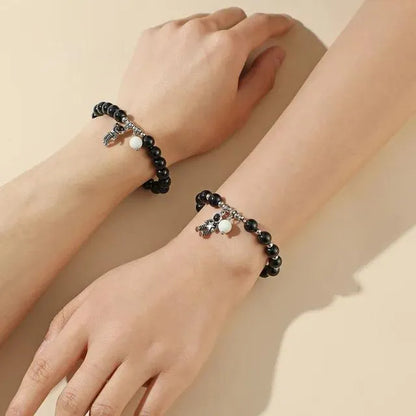 SET PULSERAS PAREJA LUMINOSA SAN VALENTÍN ASTRONAUTA NEGRO